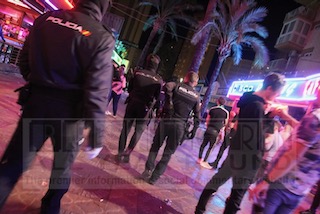 Police in square at midnight