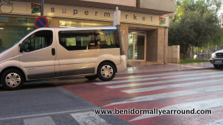 Car on zebra crossing