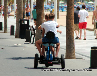 2 boys on scooter
