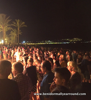 crowds around fire
