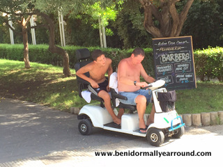 2 lads on double scooter