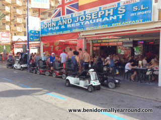 scooters parked outside john josephs