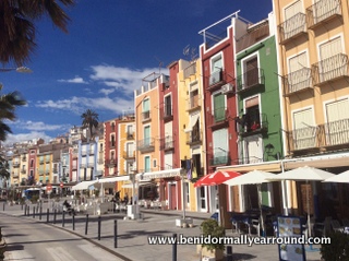 coloured houses on beachfront